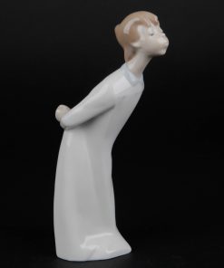 Boy Blowing 4869 - Lladro Figurine