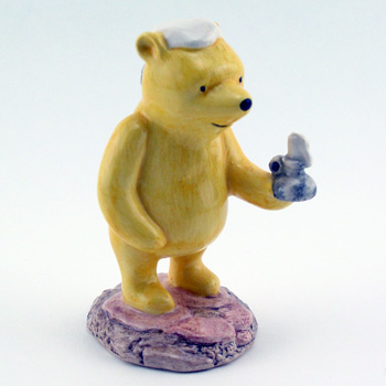 Pooh Lights The Candle WP11 - Royal Doultoun Storybook Figurine