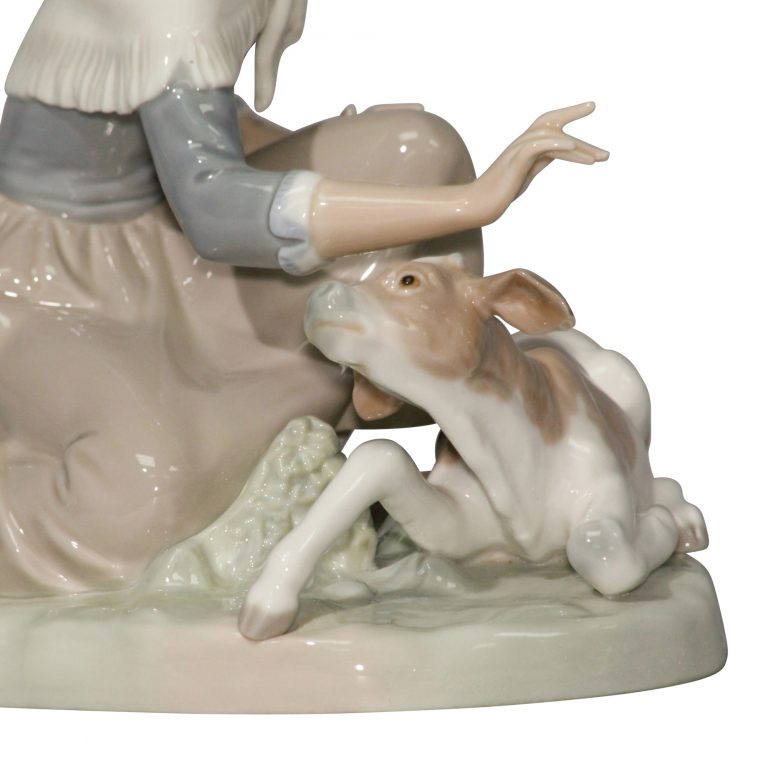 Caressing Little Calf 4827 - Lladro Figurine